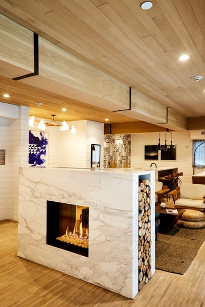75x65 Tunnel 2 Fireplace Divides Two Gathering Spaces