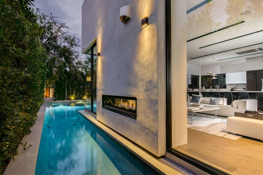 7 Reasons to Stand in Awe of the Indoor Outdoor See Through Fireplace